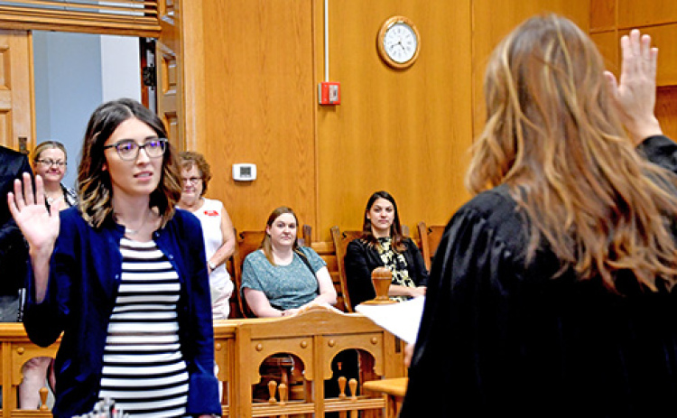 Carly Noack takes the oath as she is sworn in as Hamilton County clerk magistrate by Judge Lynelle D. Homolka Wednesday afternoon, Sept. 13.
