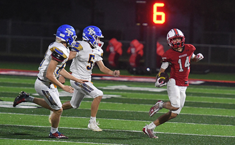 Aurora sophomore Canon Allen has been a huge part of the Huskies offense through the first half of the regular season, gaining big yards here on a punt return against St. Paul.