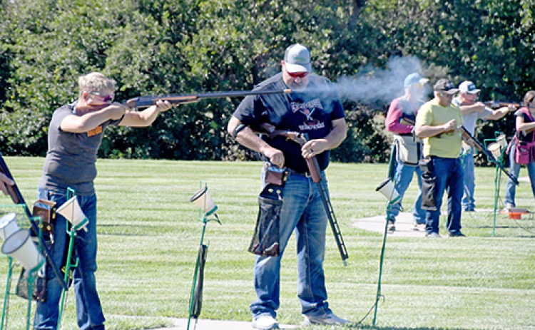 Mason Epp fires his shotgun at a bluerock during Sunday’s trophy shoot at Crooked Creek Gun Club south of Aurora. The club hosts more than 20 events each year, in addition to offering trap leagues and youth events in the spring.