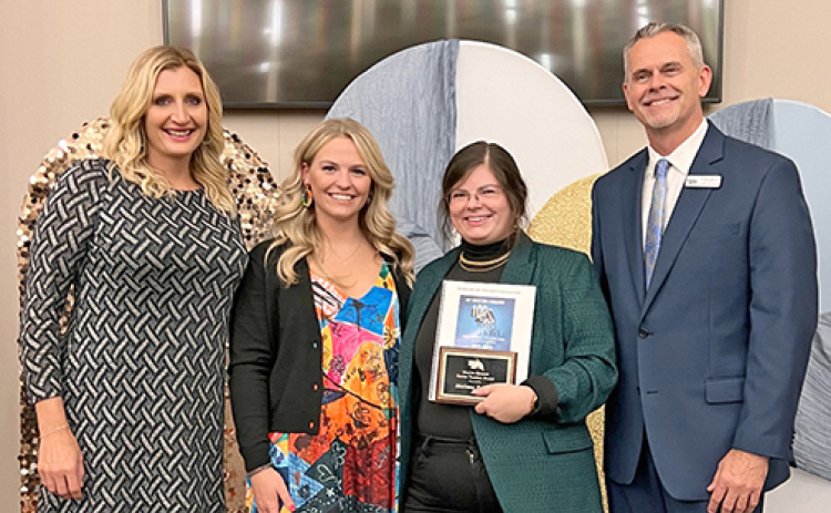 Melissa Sellers, second from right, was presented with the Marvin Spomer Novice Art Educator Award, named after Marvin Spomer, a founding member of Nebraska Art Teachers Association (NATA). Sellers is seen here at the awards ceremony held Friday in Lincoln. Pictured from left are Crystal Hassenstaab, the awards chair for NATA; Sellers’ nominator and K-6 art teacher for Kearney Public Schools, Kameran Dostal; Sellers and NATA president, Bob Reeker. 