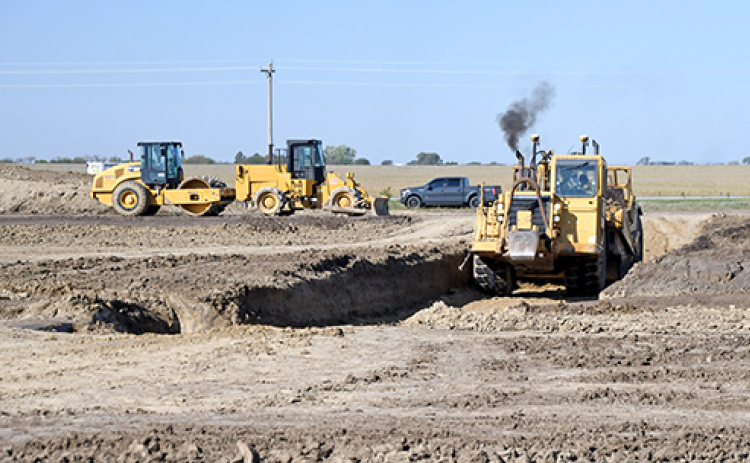 Lots of dirt is being moved now at the Mission Critical site on Highway 14, the first steps in a construction project involving a manufacturing plant for Specialty Ag Formulations.