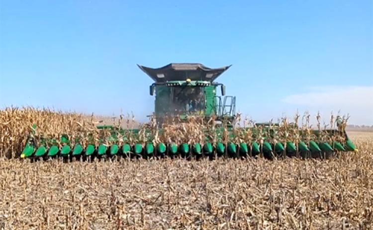 When using this new 27-row header constructed by Bish Enterprises of Giltner, the John Deere X9 combine can harvest up to 7,357 bushels of corn per hour traveling at a speed of six mph.