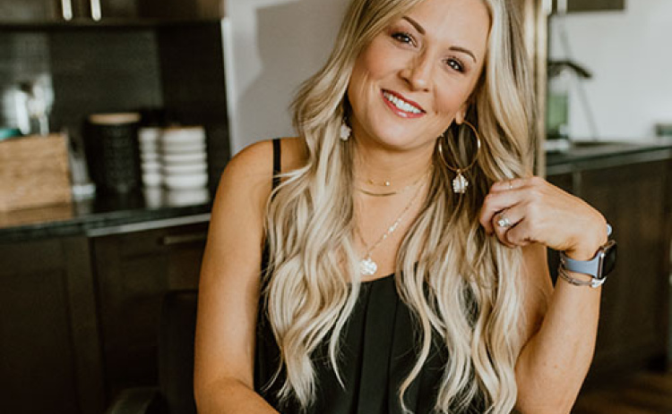Kylie Bruns poses for a promotional photo for her business, Bah-Shah Salon & Suites in Lincoln.