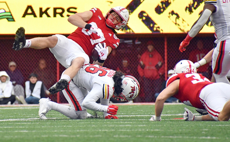 Nate Boerkircher is brought to the ground after successfully carrying out a fake punt on Nebraska’s first offensive series.