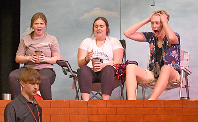Actors playing overly involved sports parents include, from left: Karly Eastman, Kailyn Wilson, and Ayden Scott.