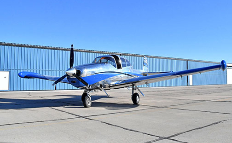 This 1947 Navion airplane that has been hangared at the Aurora Airport for the past several years while undergoing a makeover, shines like chrome but the skin is actually polished aluminum accented with blue.