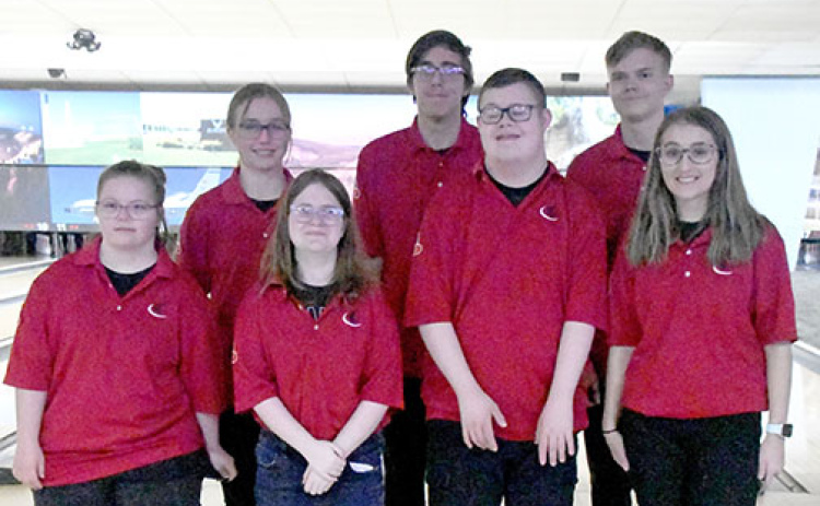 Members of the Aurora High School Unified Bowling pose for a team photo prior to their tournament in Grand Island on Saturday, Nov. 18. From left, front row Kate Glinn, Bre Telford, Quinton Lange, Maggie Brandt; back row Jessica Schleichardt, Nicholas Schleichardt and Jacob Fink. Not pictured are  Cheyenne Aspergren, Sofia Hendrickson, Alex Jimenez, Zeke Jimenez, Bradin Kenndey, Teagan Peterson and Jorja Pohlmeier.