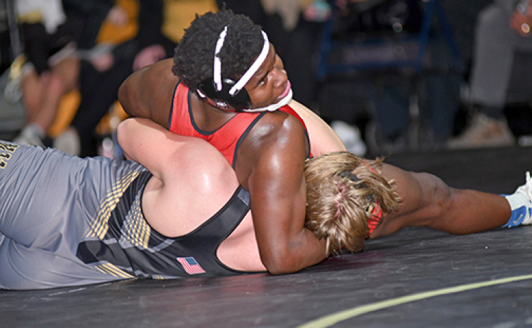 Kendrik Owens was down on the scoreboard in his match, but picked up a pinfall victory anyway at Grand Island Northwest last week.