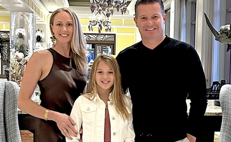 Aurora High School grad Darcie (Lee) Burde lives with her husband, Adrian and her daughter Isabella in Gainesville, Fla., where she works as a program development manager for the National Fitness Campaign, a wellness consulting firm.