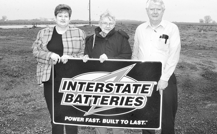 This photo, taken in 2003, shows Interstate Battery owners, from left: Paula Danhauer, the late Dee Koberstein, and Lee Danhauer, standing on a Highway 14 site where construction was about to begin on a new location. Dee and her husband, Bob, moved from Florida to Aurora in 1973 to establish a business which marked its 50th anniversary last year. Zack Danhauer is now the franchise distributor, representing the third generation of family ownership.