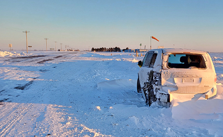 This wrecked minivan parked along Highway 14 near the Aurora Cemetery on Friday morning was one of several vehicles involved in a pileup caused by Thursday afternoon’s surprise snow squall that blew through this area. As many as a dozen cars were damaged in several multi-vehicle collisions