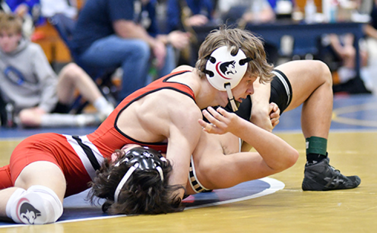 Karsten Hohm won his first Central Conference championship Saturday in York, finishing fourth and third in his first two seasons.