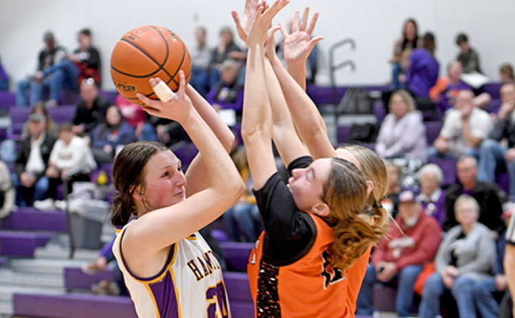 Hampton senior Nevaeh Lukassen fought through the pain of having a dislocated finger in Friday’s home finale, scoring 15 points in the Lady Hawks win over Giltner.