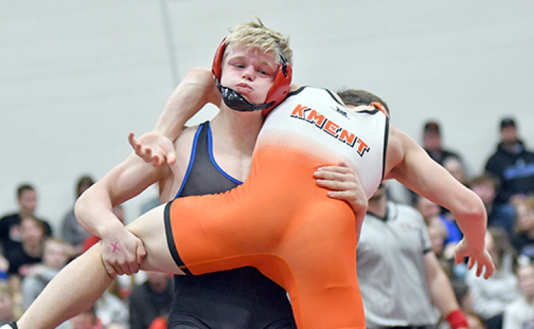 Gage Friesen was one of three High Plains wrestlers to win a district championship as the Storm also brought home the team title from the D-3 meet Saturday in Pleasanton.