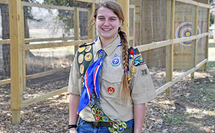 Aurora senior Kimberly Evans stands in front of her hatchet target set as part of her Eagle Scout Service Project. She is projecting to have her Eagle Scout Court of Honor on Saturday, April 6.