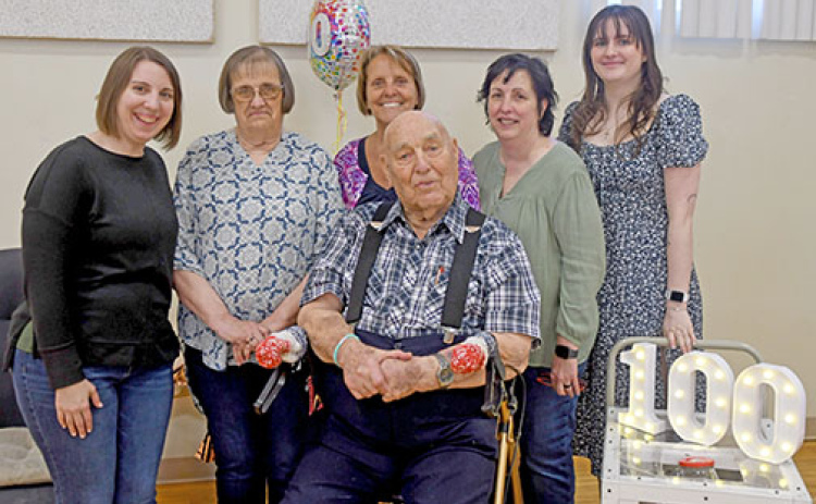 Ramer Fassnacht (center) celebrated his 100th birthday on March 4. Celebrating with him, from left, are his granddaughter, Katie Elder, daughters Glenell Ratzlaff,  Joleen Gustafson and Teresa Elder-Smith and granddaughter Lizzy Smith.