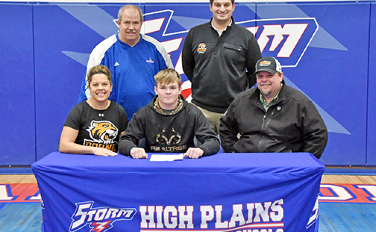 Wyatt Urkoski signed a letter of intent to play football at Doane University Feb. 22. Urkoski was joined by his parents, Kevin and Shelly, HPC football coach Greg Wood and Doane football coach Jonathan Johnson.