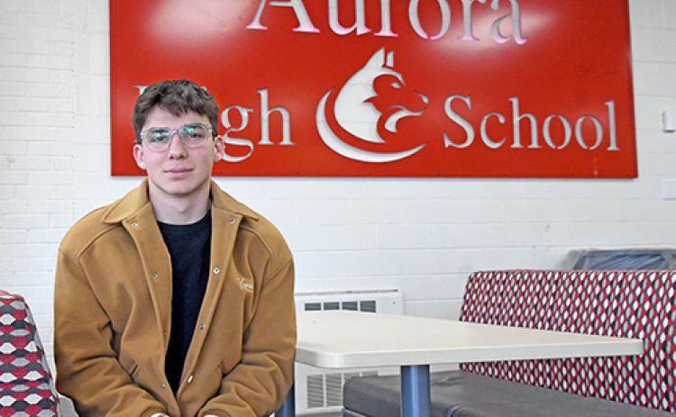 Noham Borie has become more confident learning English with the help of friends at Aurora High School.