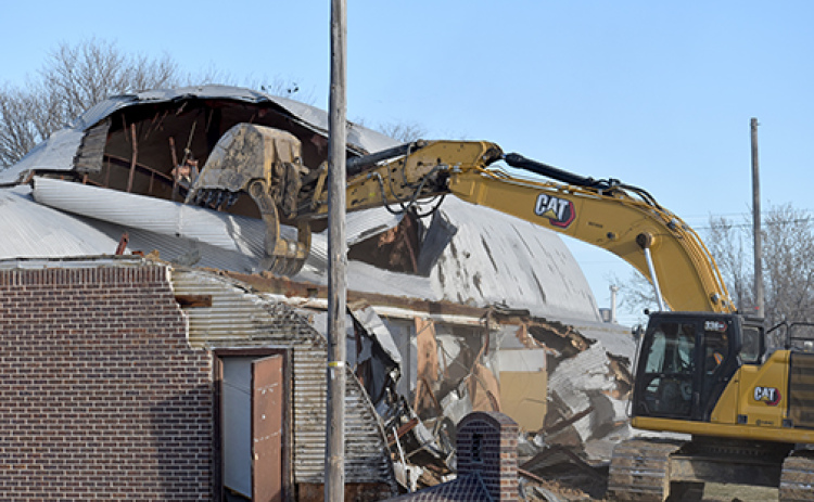 The original Phillips Memorial Hall, completed in 1949 as a memorial to WWII veterans, passed into history last week. The wood and steel building, which was replaced by the nearby new Phillips Memorial Hall in 2016, was demolished by a local construction company and the debris hauled away.