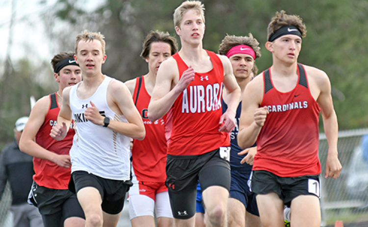 Charlie Evans broke free from a four-wide pack in the final 200 meters to win the 1600 run at Monday’s Central Nebraska Track Championships.