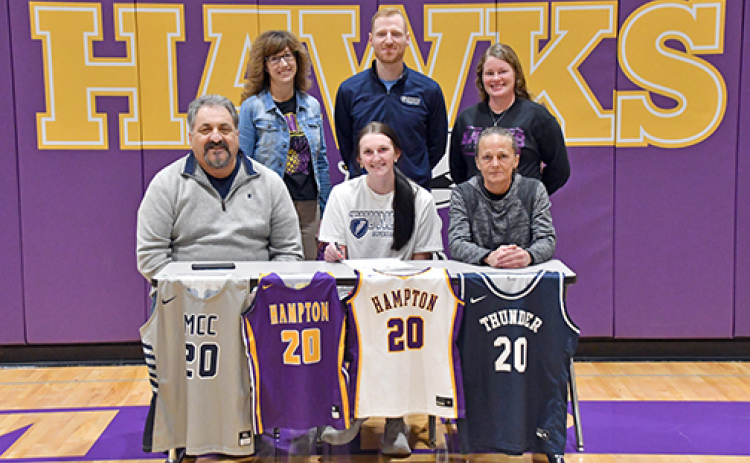 Hampton’s Neveah Lukassen will continue her education and basketball career at Manhattan Christian College. She signed March 22 with her family, Heaven Hall and Randy Maahs as well as Hawk coaches Margo LaBrie and Teya Mason with new MCC coach Dalton Miller.