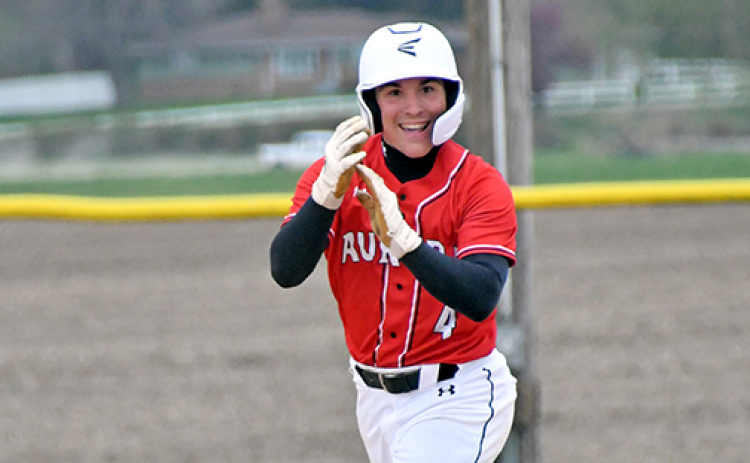 Keegan Chaney celebrates rounding second base after hitting Aurora’s first home run in school history during a 6-5 win over St. Paul/Palmer Thursday.