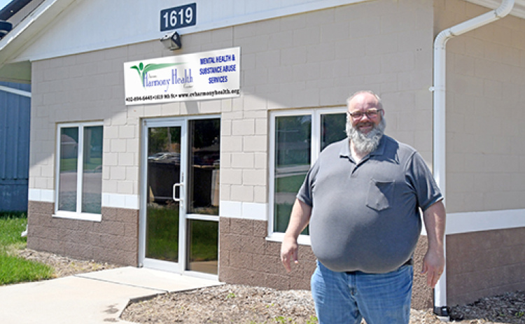 Aurora Harmony Health Center owner Brad Shay stands outside the new building Harmony Health will be moving into, located at 1619 9th St., where Nebraska Kinesiology Center was previously located.