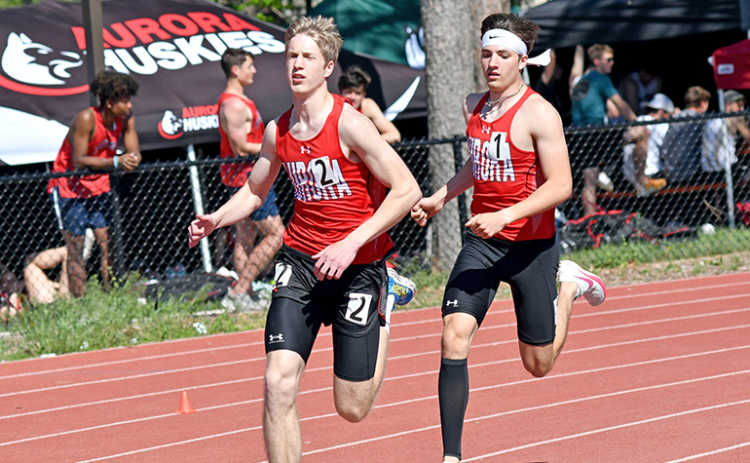 Aurora’s Charlie Evans has the slight edge over teammate Lucas Gautier during the second lap of the 800 run at last week’s Central Conference meet in Crete. Evans and Gautier finished 1-2 in the event.