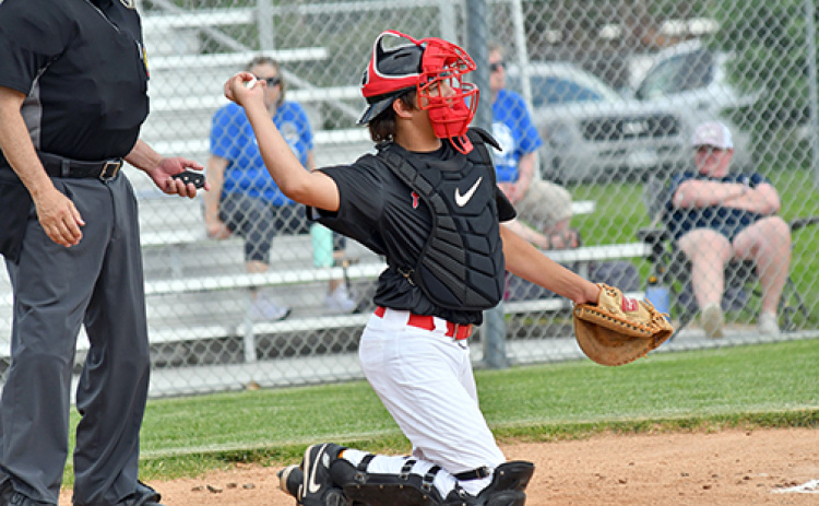 Sawyer Kiner had a big game for the Aurora Cooperative Juniors team with three hits and three RBIs along with his catching duties.