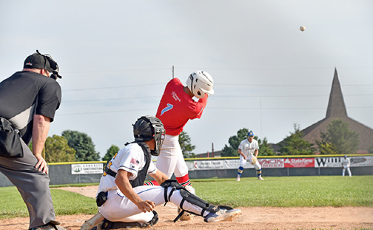 Devin Otto smashes a pitch towards the outfield during a game earlier this season.