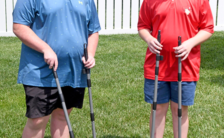 Mason and Carter Howland have formed M&C Dawg Patrol and are dedicated to helping pet owners keep their yards free of pet waste all year around.