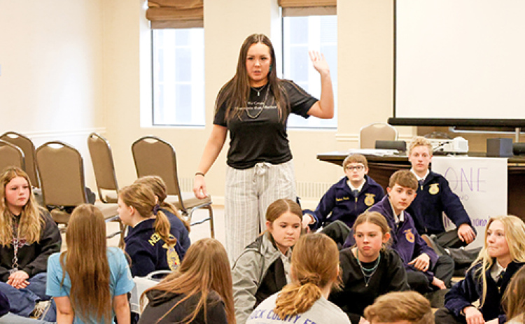 Ashley Kroese, seen here working with students at a state FFA event, came up with the idea for SAIL Day while she was sitting in class at UNL preparing for her current career as a high school ag teacher. Kroese is working this summer as a seasonal employee at The Leadership Center where she will serve as facilitator for the two SAIL Days being launched in July and August.