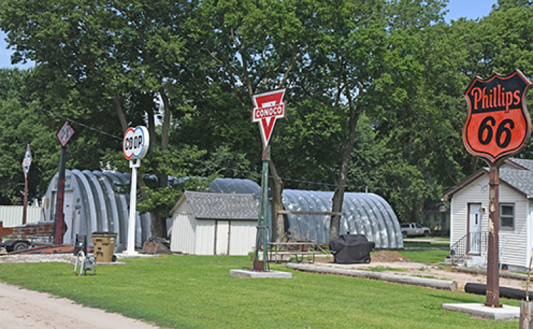 The Hamilton County Planning and Zoning Commission approved an amendment last week which would make large vintage signs like these shown in Marquette, “yard art.”  The amendment will be reviewed by the Marquette Village Board at its Sept. 9 meeting.