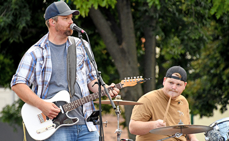 The Jason Mayer Band performed country hits as well as four original songs. From left are Mayer and drummer Cameron Russell.