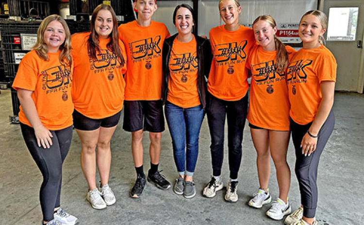 Second-year teacher Kelsey Schulte, center, helped her FFA students host their first Giltner FFA Fun Run on Saturday, Aug. 10. Pictured from left are Giltner FFA officers Karly Eastman, Kailyn Wilson, Tanner Schelkopf, Schulte, Peyton Schutt, Avery Reeson and Gracie Kreutz.