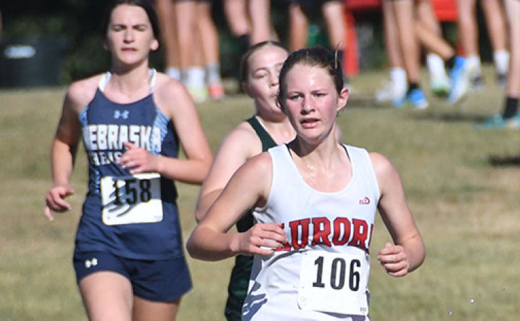 Kailey Dick runs ahead at midfield during the Central City Invite. Dick finished in 12th with a time of 22:18.