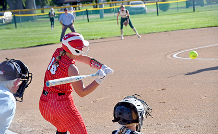 Londyn Teahon tees off during her first at-bat against Central City Thursday, a 5-3 win for the Huskies. Just two days earlier, Teahon hit a three-run walk-off homer against Grand Island Northwest, highlighting the team’s first win over the Vikings since 2010.
