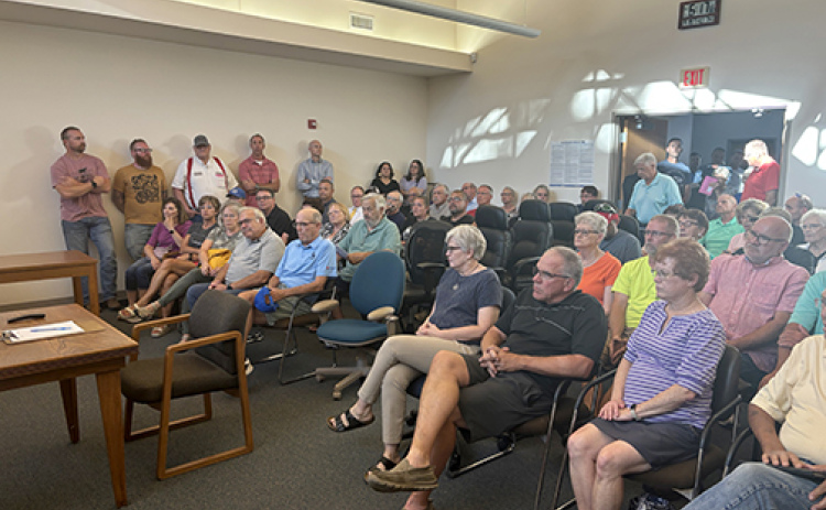 The council chambers at Aurora City Hall were overflowing with poeple during Thursday's 'pink postcard' public hearing regarding a proposed 38 percent property tax increase.