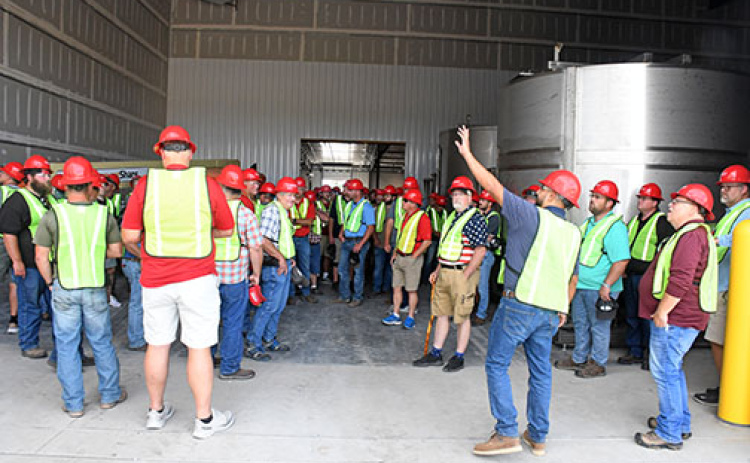 Ag producers and seed reps tour the new Specialty Ag Formulations facility in the Mission Critical Subdivision.