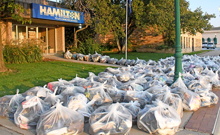 Up to 128 bags of shoes were collected by the Aurora Chapter of Philanthropic Educational Organization (A.C. PEO) and were placed by the storage building of Hamilton Telecommunications Oct. 9 for pick-up. More than $1300 will be collected by PEO to give back to women in the community through grants, loans and scholarships.