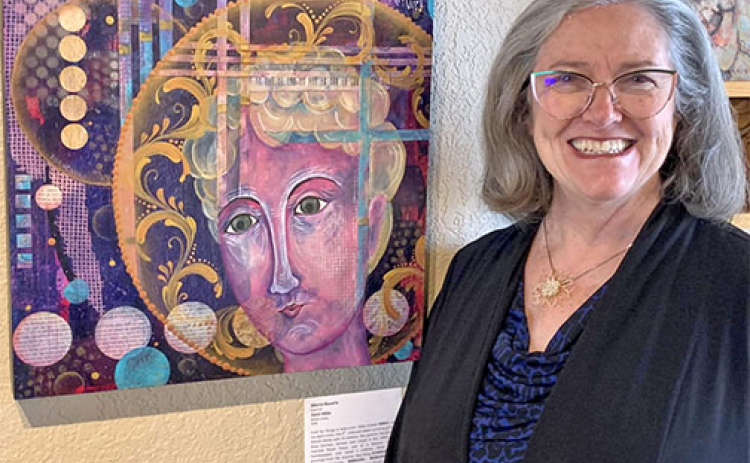 Marcia Bauerle is one of more than 20 Impact Nebraska Artists to feature an art piece for the Nebraska Roots exhibit currently on display at the Plainsman Museum in Aurora. Her mixed media collage, ‘Saint Hilda’, reflects her Russian immigrant roots.