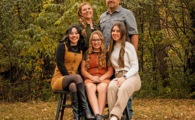 The Gimpel family poses for a fall family photo recently. Seated, from left, are Trinidi, Zoey and Laighla. Behind them are mom and dad, Beth and Todd.