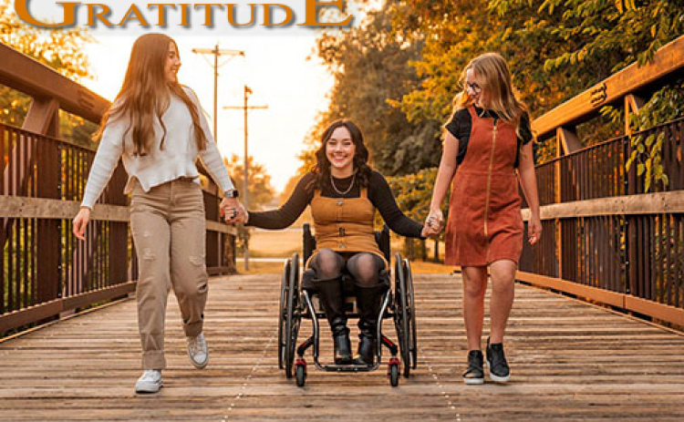 The Gimpel sisters -- from left Laighla, Trinidi and Zoey -- share a smile during a family photo shoot.