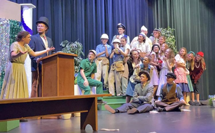 The Aurora One-Act team held a dress rehearsal for its comedy production of “MAYOR” last Tuesday night. Leading the scene is Jorja Pohlmeier (left) as Dorene, the mayor’s wife.