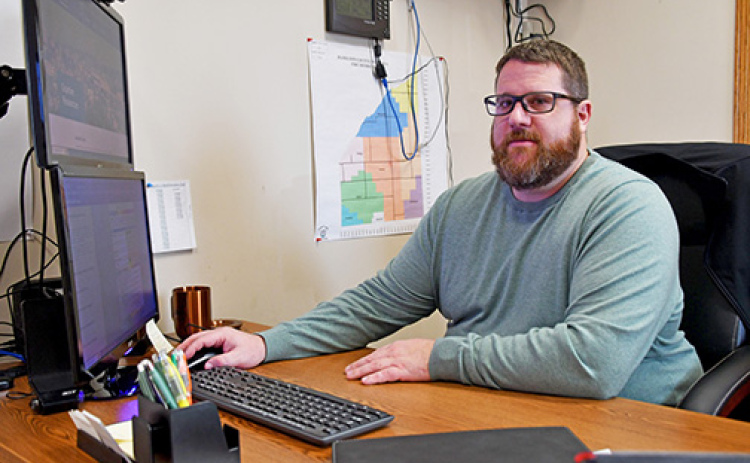 Ben Crabtree, Hamilton County’s new director of emergency management, works in his office located in the main fire station in Aurora.