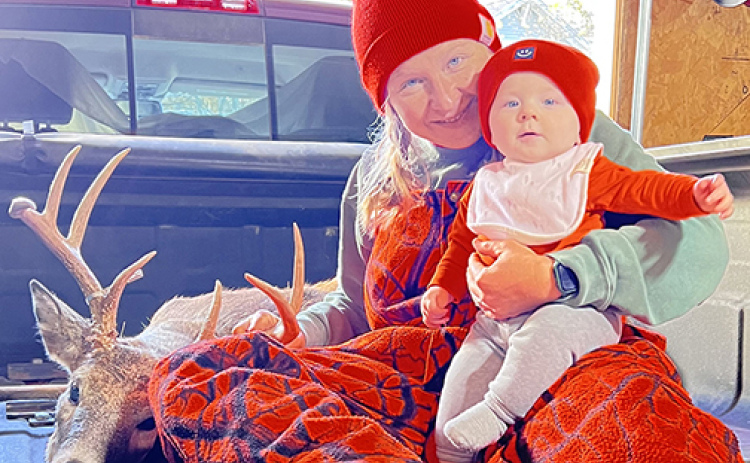 Nikki Bosak and her son, Krew, pose for a photo opp on opening day of deer hunting season. This photo was selected as the top entry in this year’s ANR Super Shot Contest.