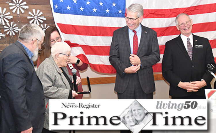 Lt. Gov. Joe Kelly (center) and others share a laugh after WWII medal recipient Carol Robotham cracks a joke related to her military service.