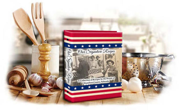 “Our Signature Recipes” is set to be available prior to Thanksgiving. Featured is the prototype cover of the cookbook featuring a photo of a soup stand at the Hamilton County Fair in Orville City in 1873.