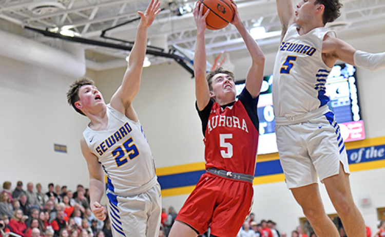 Ryan Staehr was one of several heroes for the Huskies in back-to-back overtime wins last week against Kearney Catholic and Seward, hitting a game-tying shot against the Stars to force the extra session while coming up with a game-clinching steal against the Bluejays.