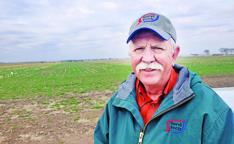 Certified Agronomist Orvin Bontrager of Aurora (above) has more than 45 years of experience helping farmers grow crops. At right is a photo he took last year of what he calls a moderate infection of tar spot on a corn leaf. He said when it gets to this stage it is almost too late to apply fungicide.